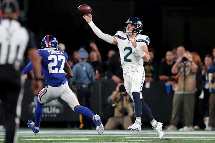 Drew Lock stepped up replacing Geno Smith, rolling out to connect with Noah Fant for a 51-yard catch and set up a Ken Walker III touchdown run before halftime.